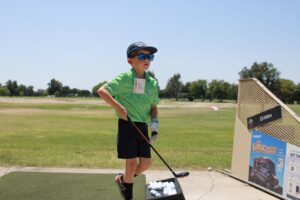 boy on golf range