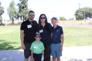 Family golfers at i heart golf
