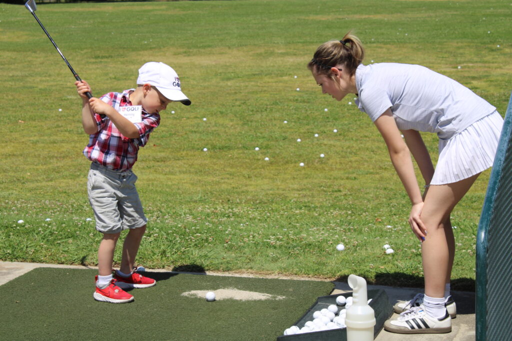 Young golfer at I love golf program